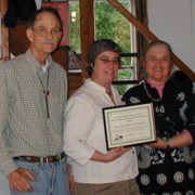 President Linda Campbell (center) with Ken and Marnie Crowell